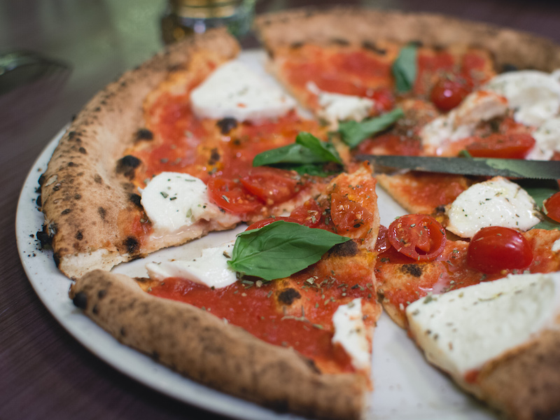 Simple italian pizza with cherry tomatoe